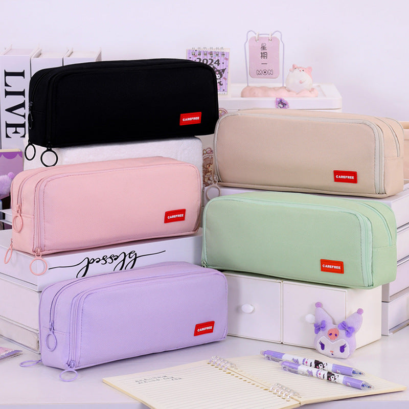 Pencil case with double zipper and variable compartment arrangement Bowlift