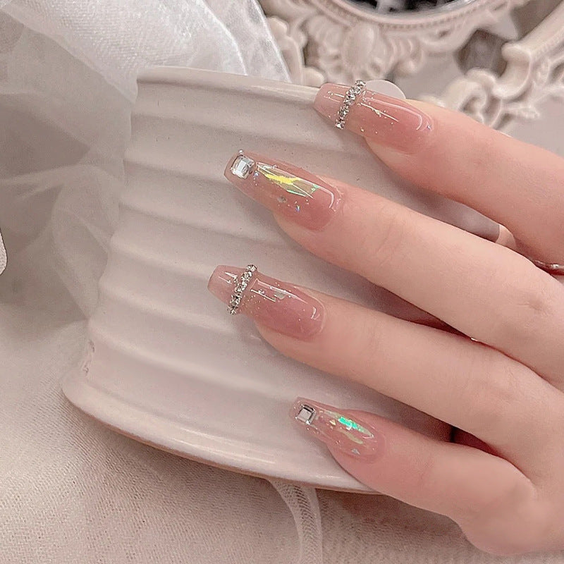 Acrylic nail set with glamorous rhinestone and glitter elements Bowlift