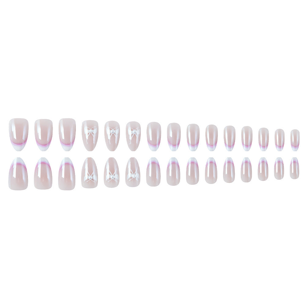 Elegant French Tip Press-On Nails with Bow Accents Bowlift