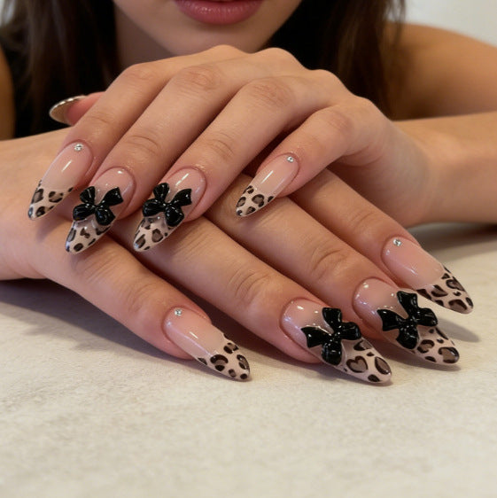 Artificial nail tips with elegant leopard pattern and bow decoration Bowlift