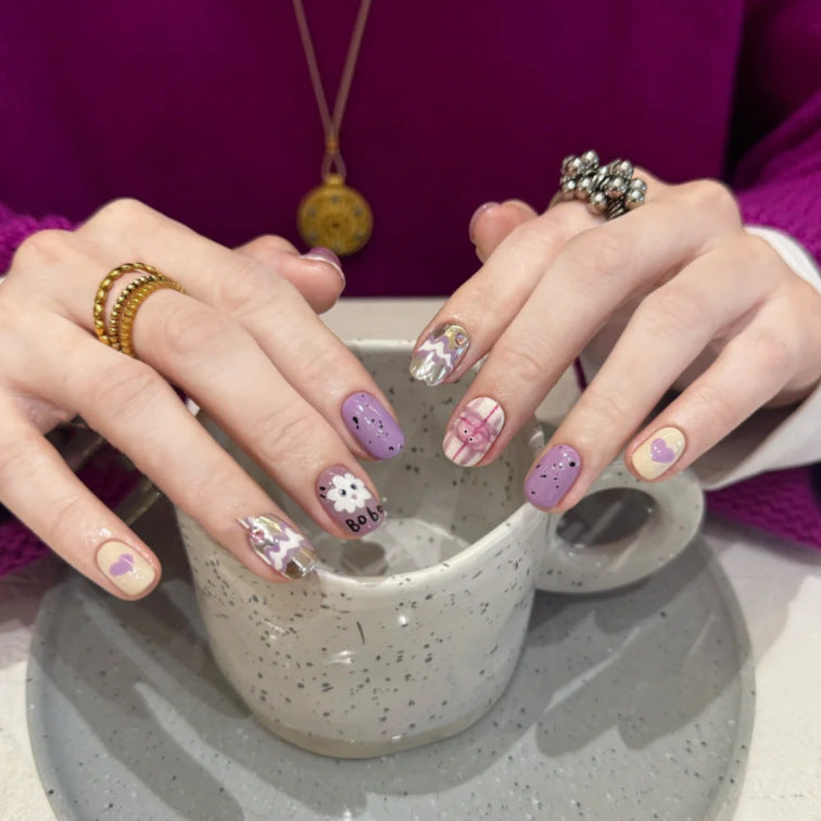 Playful Cartoon-Themed Press-On Nail Art Set Bowlift