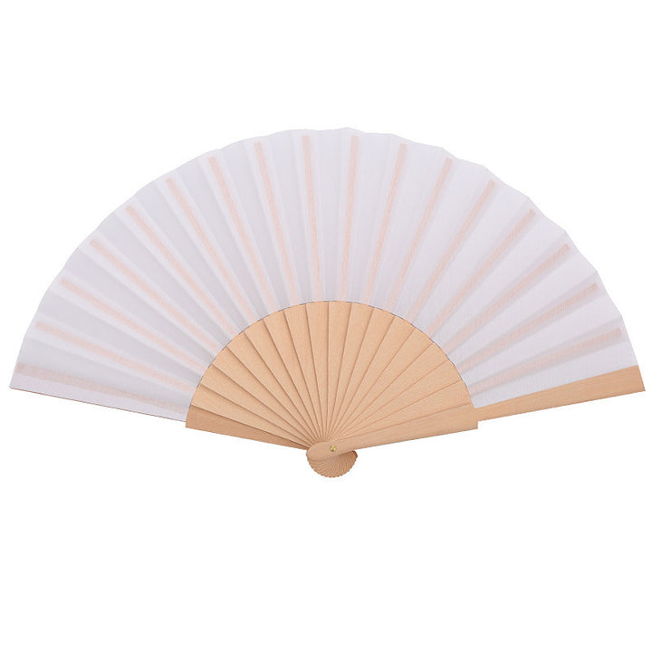 Ladies folding hand fan made of airy material with intricate folds Bowlift