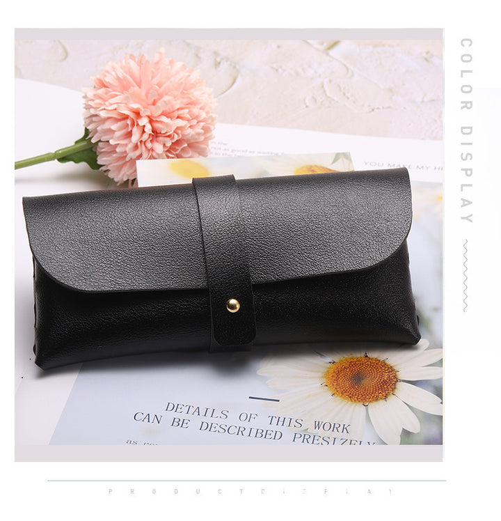 Unisex glasses case made of high-quality leather with button-crafted closure Bowlift