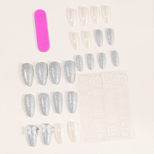 Elegant Stiletto Nail Art Extensions with 3D Bow Accents Bowlift