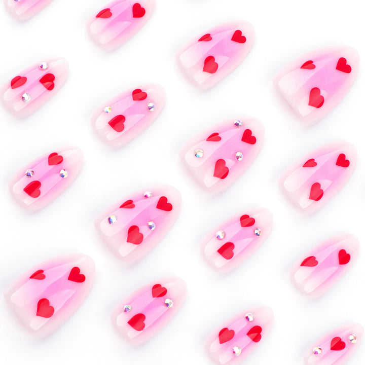 Artful nail art with heart motifs and glamorous details Bowlift
