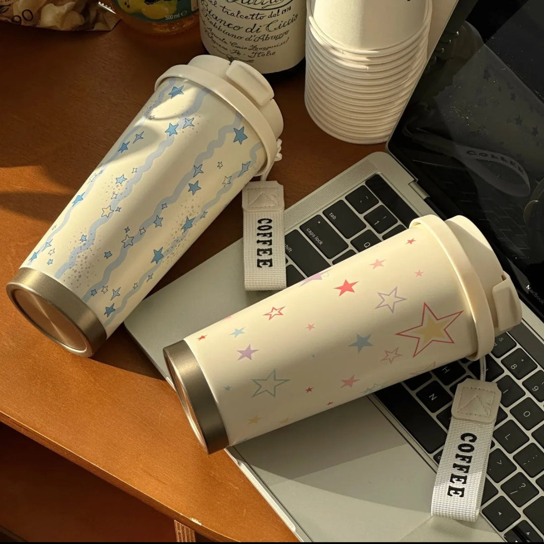 Women's insulated mug with practical carrying handle and charming Hello Kitty design Bowlift