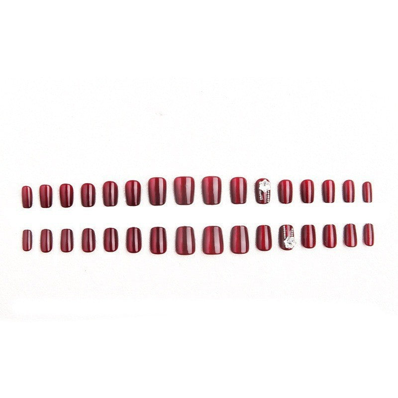 Artificial nail set with sparkling accents and glamorous design Bowlift