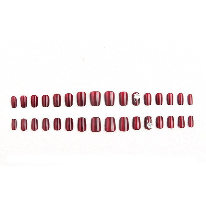Artificial nail set with sparkling accents and glamorous design Bowlift