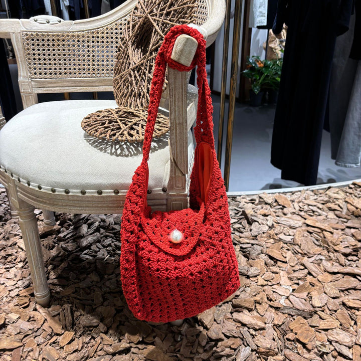 Hand-knotted shoulder bag with bead closure Bowlift