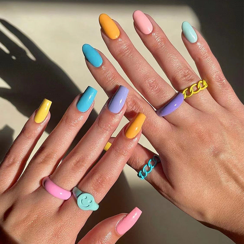 Artificial nail art with colorful designs Bowlift
