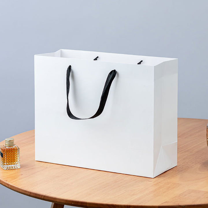 Premium Reusable Paper Gift Bag with Ribbon Handles and Reinforced Base Bowlift