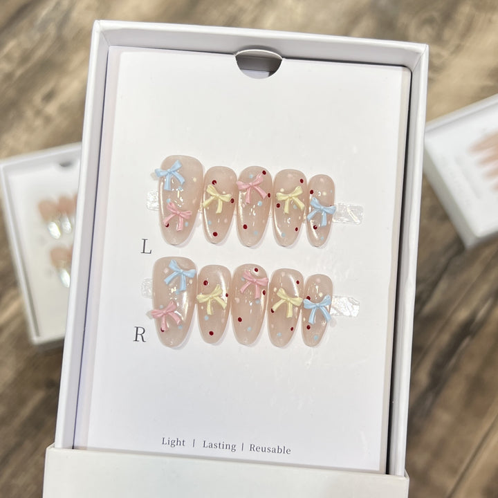 Decorative Press-On Nail Set with Charming Bow and Dots Bowlift