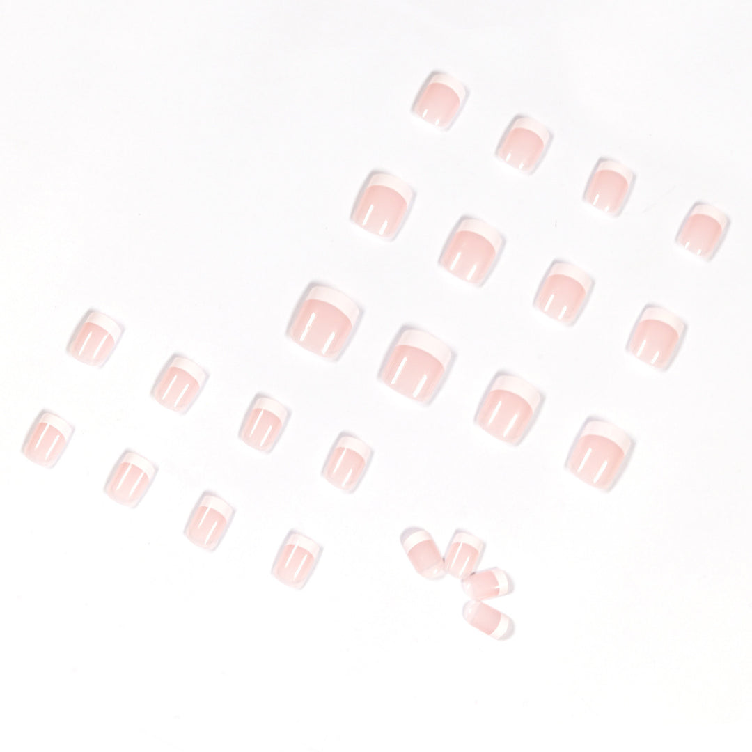Artificial nails in French Tip design Bowlift