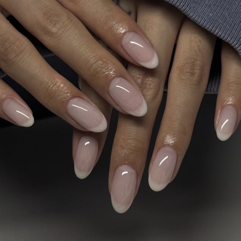 Elegant stiletto nails with classic French tip Bowlift