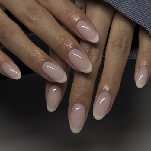 Elegant stiletto nails with classic French tip Bowlift