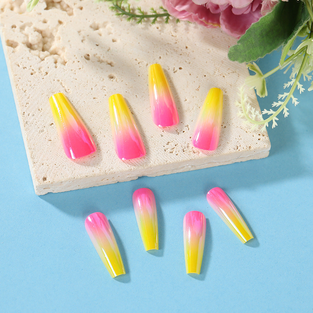 Artificial nail tips in modern ombre design Bowlift