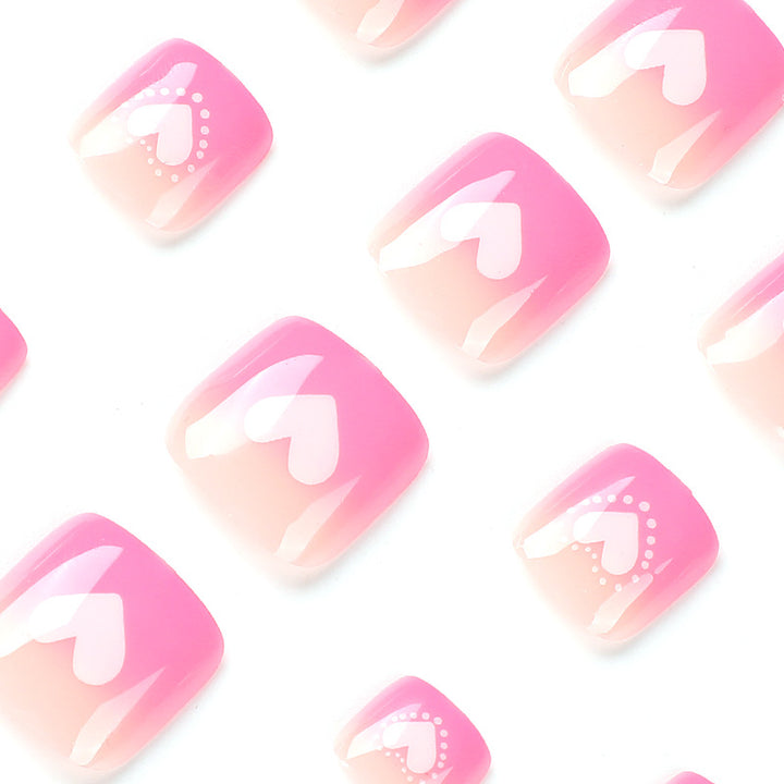 Artful toenail design with heart motifs Bowlift