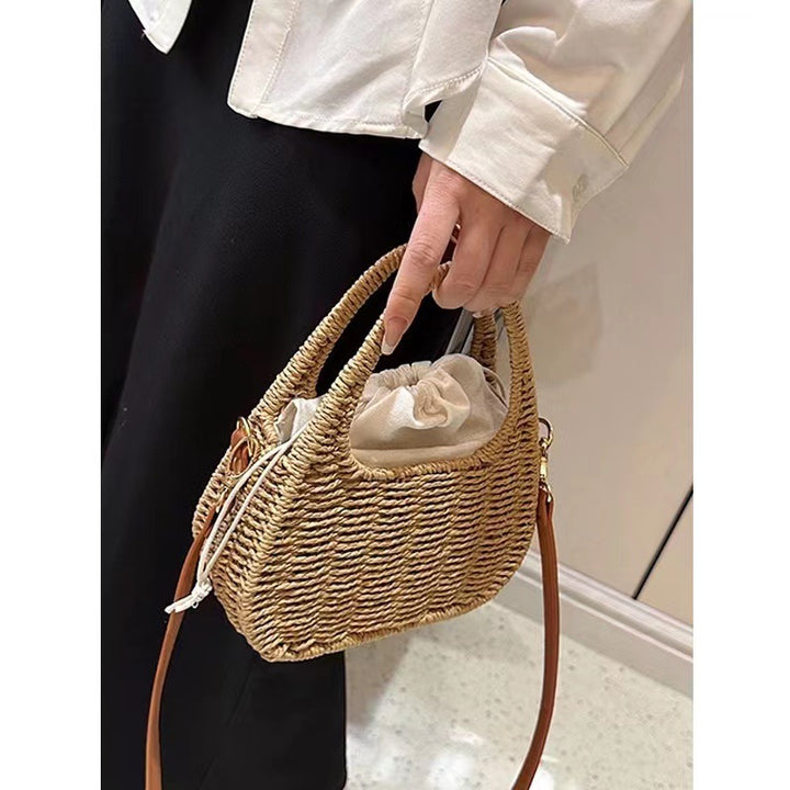 Fashionable wicker handbag with elegant leather detail Bowlift