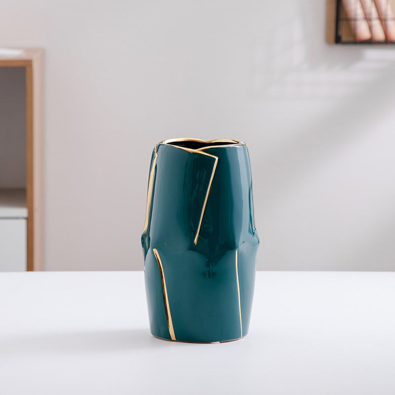Decorative ceramic vase with golden accents Bowlift