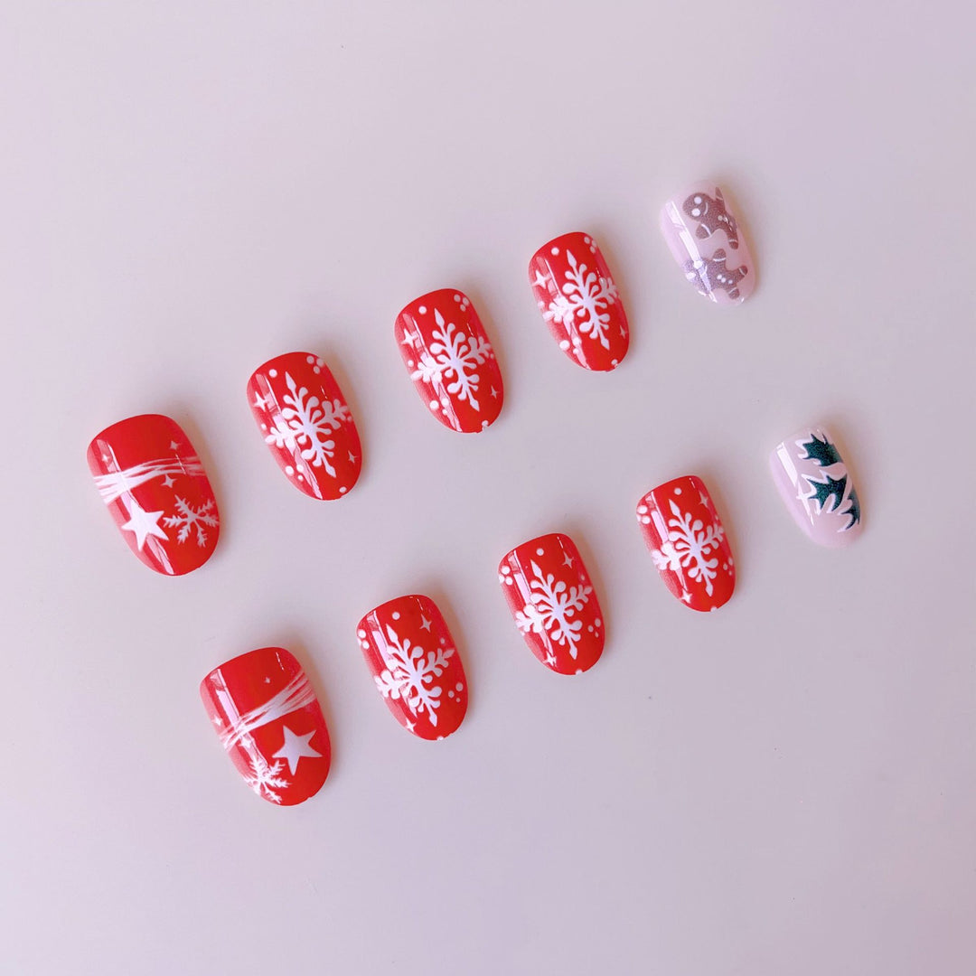 Artificial nail set with winter motifs and glamorous Christmas designs Bowlift
