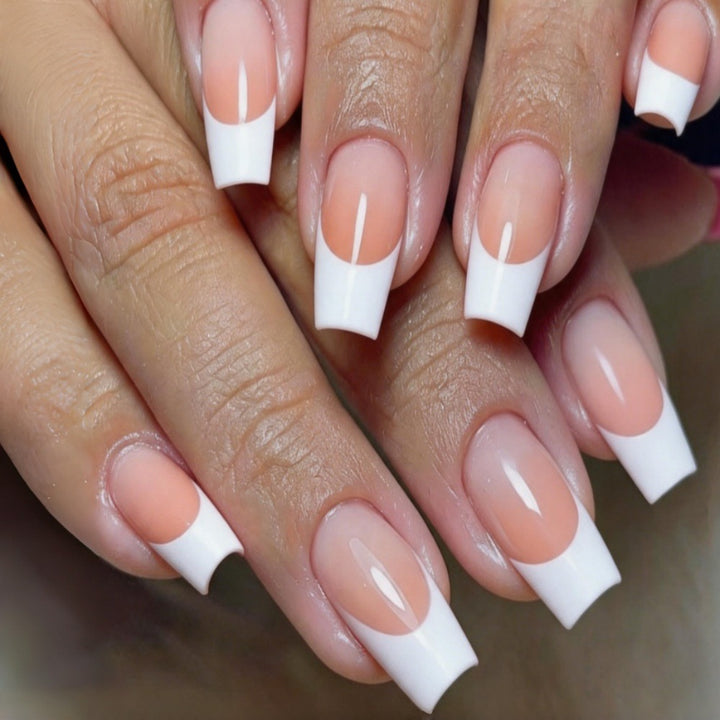 Elegant artificial nails in classic French design Bowlift