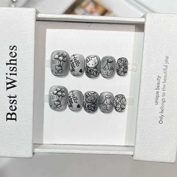 Artistic Press-On Nail Set with Whimsical Character Designs Bowlift