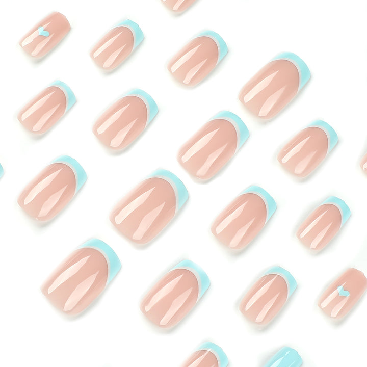 Artful nail art with pastel blue accents Bowlift