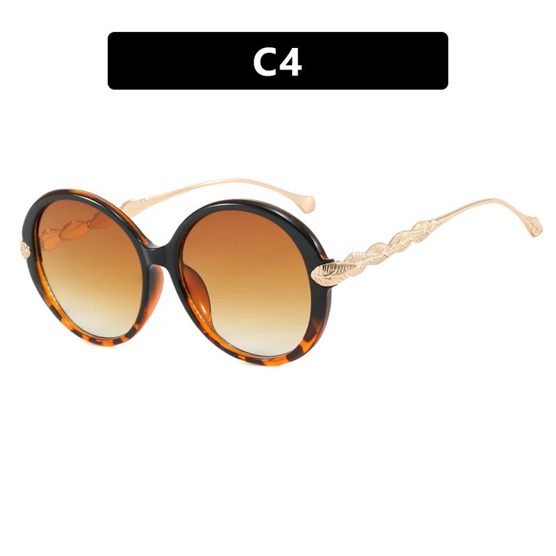 Ladies large round sunglasses with decorative metal accents Bowlift