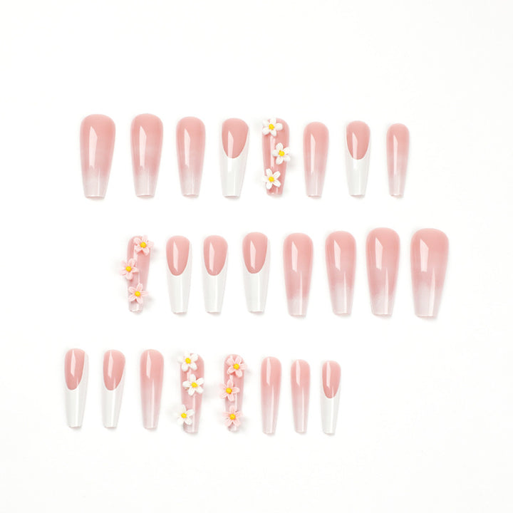 Artful nail extensions with elegant gradient and creative floral accents Bowlift