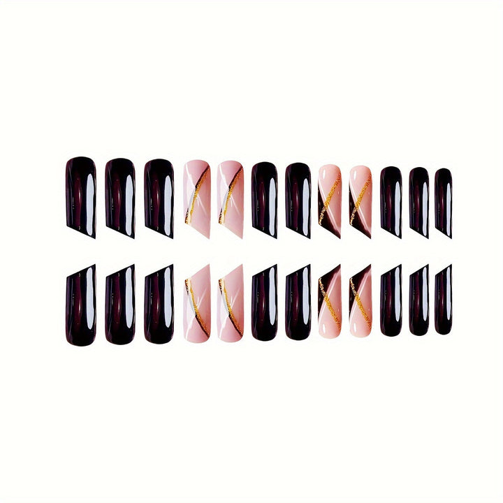 Elegant Stiletto Nail Enhancements with Golden Accents Bowlift