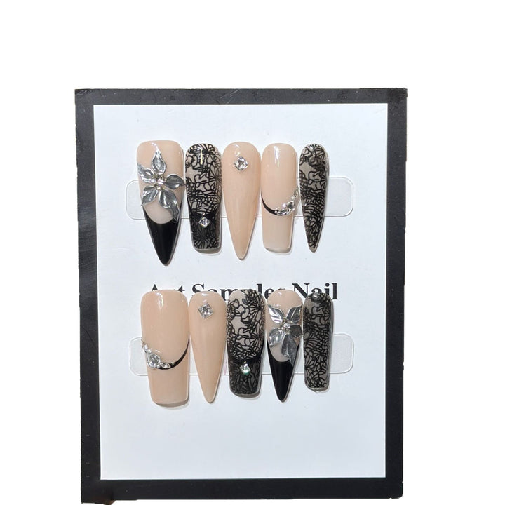 Artistic Stiletto Press-On Nail Set with Floral and Geometric Accents Bowlift
