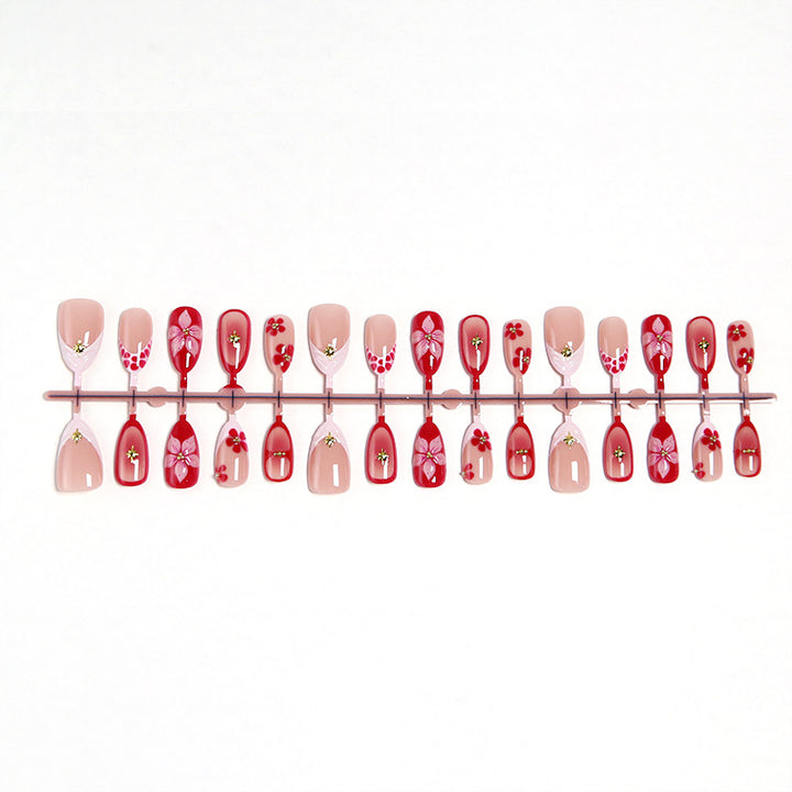 Artificial nails with floral design and glamorous accents Bowlift