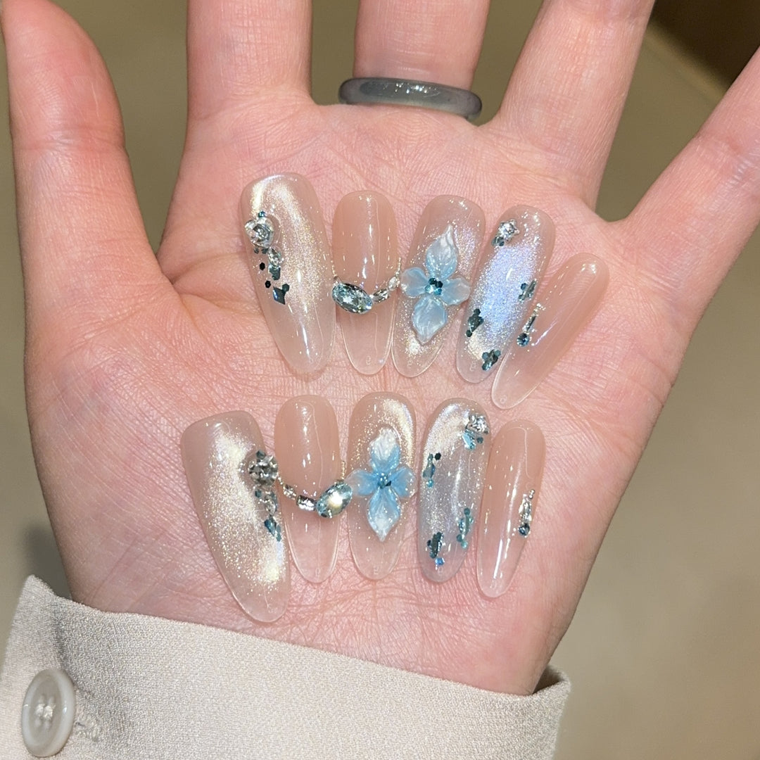 Artificial nails with unique floral design and glitter accents Bowlift