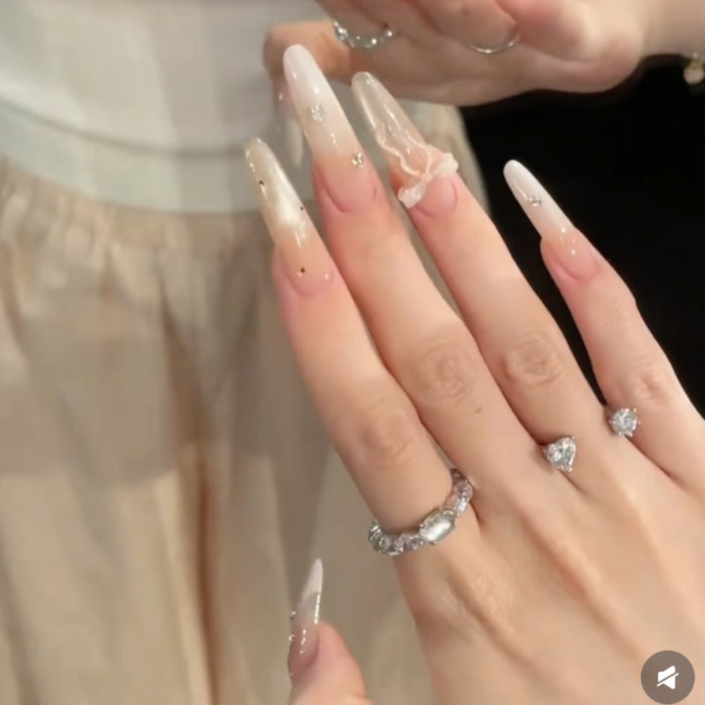 Artistic Stiletto Press-On Nail Set with Decorative Accents Bowlift