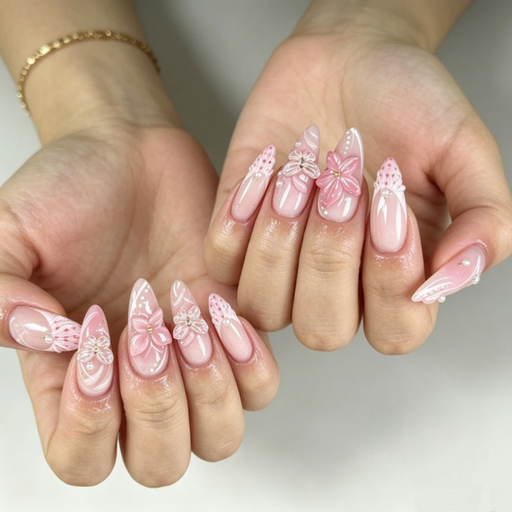 Artificial nails with romantic flower and butterfly accents Bowlift