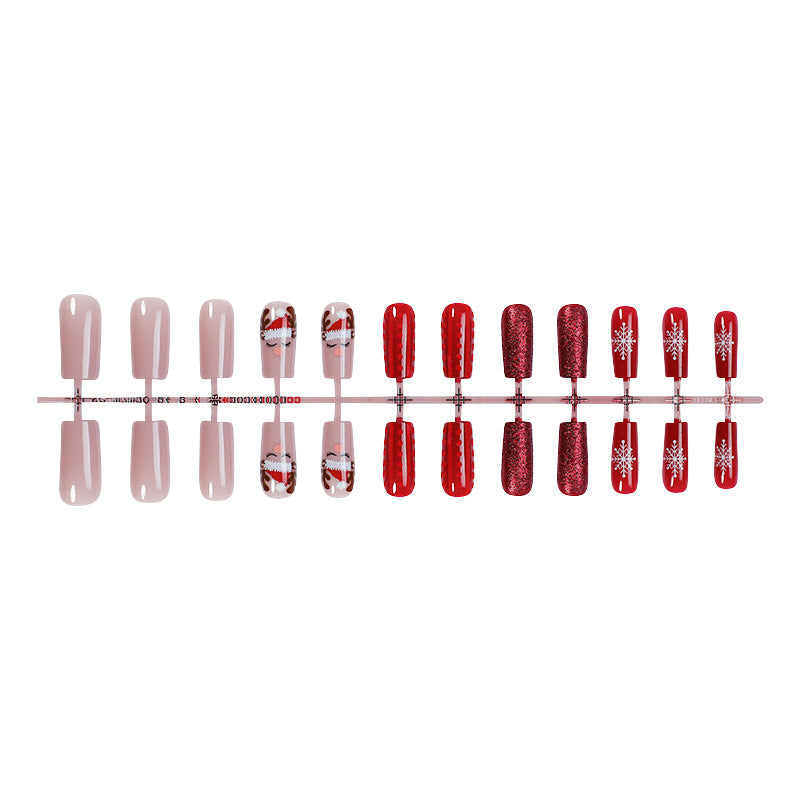 Artificial nail set with festive Christmas designs and glitter accents Bowlift