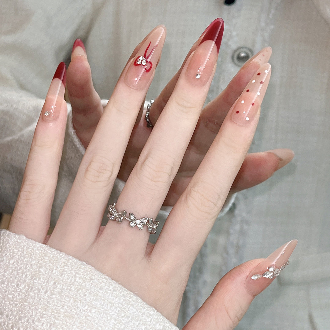 Artistic Press-On Nail Extensions with Decorative Patterns Bowlift