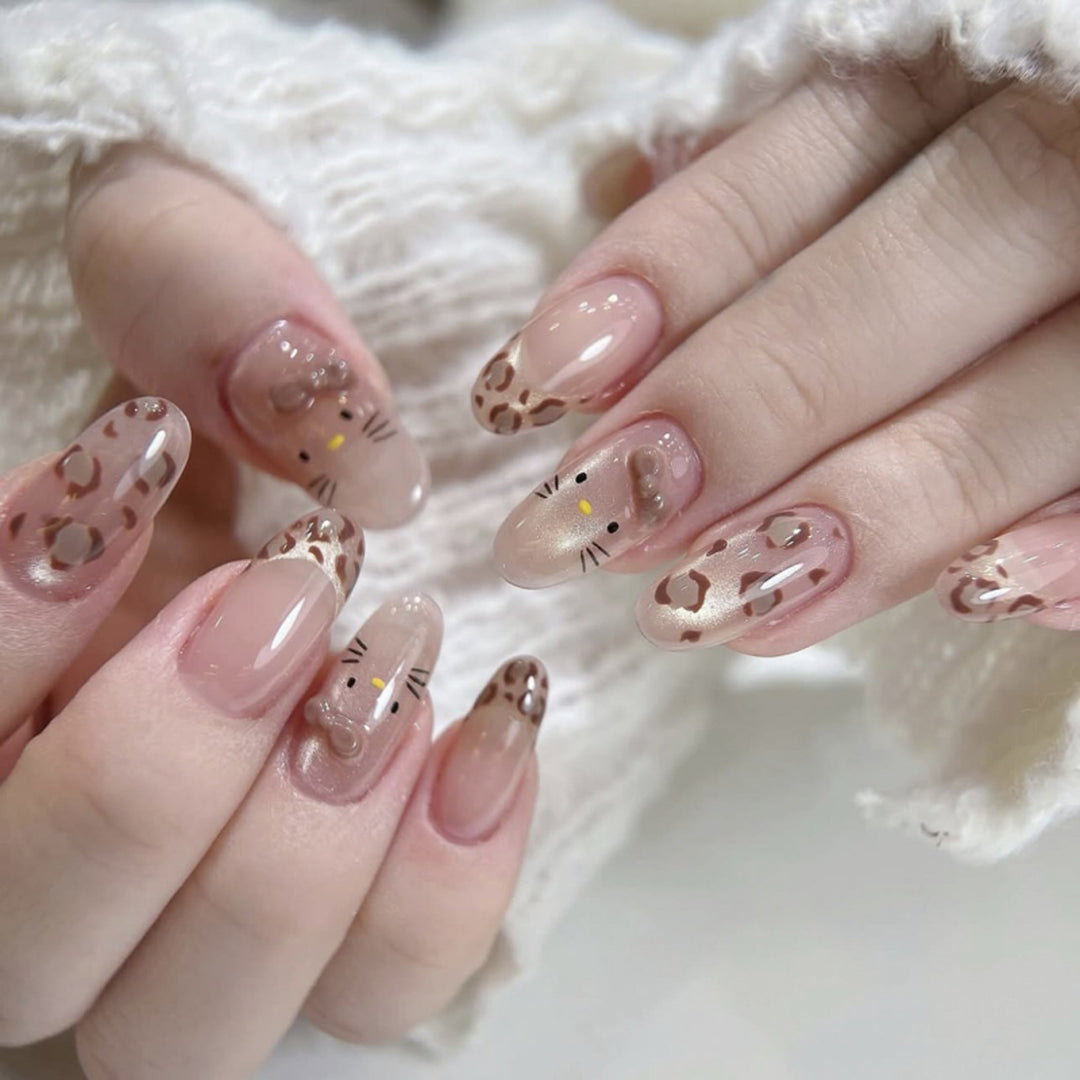 Creative Nail Art with Cute Cat Motif and Glitter Accents Bowlift