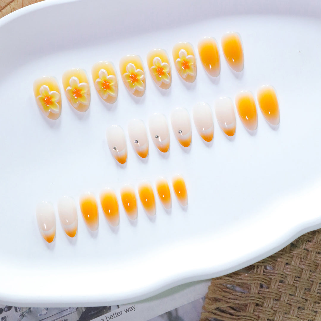 Artful nail extensions with delicate ombre effect and floral accents Bowlift