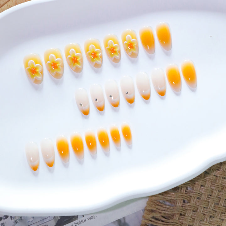 Artful nail extensions with delicate ombre effect and floral accents Bowlift