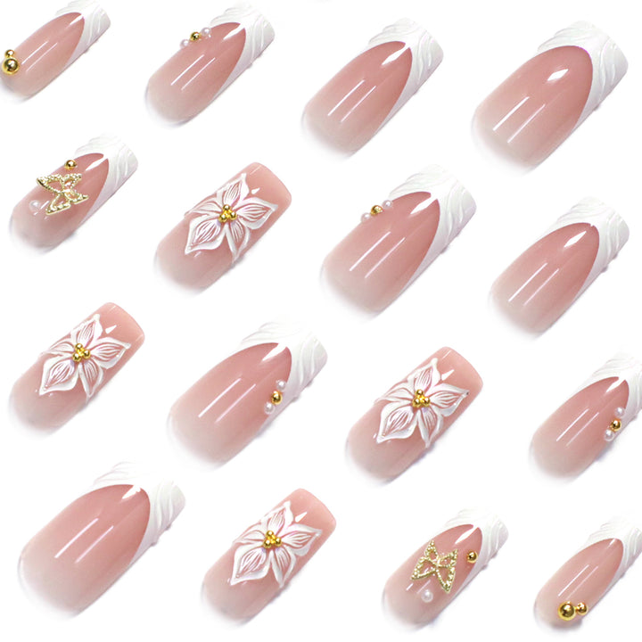 Elegant artificial nails with floral design and gold accents Bowlift