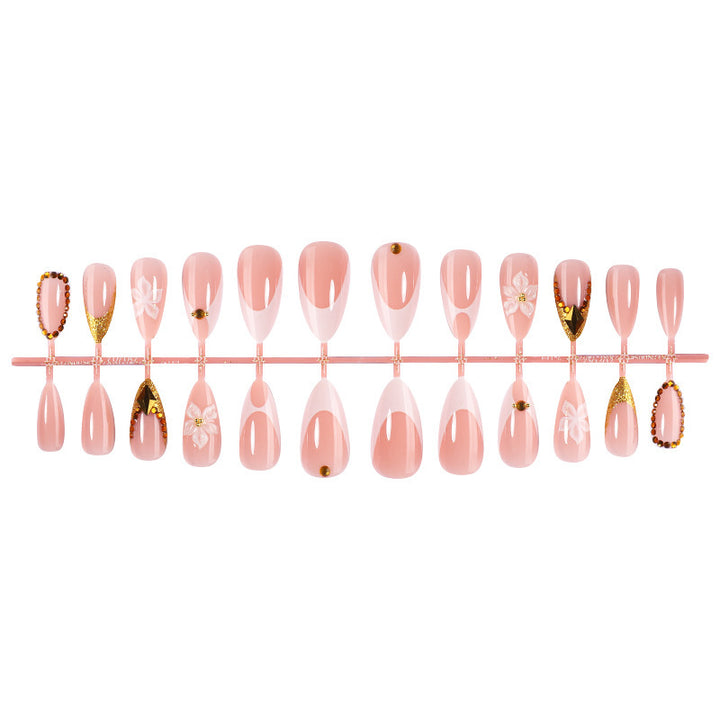 Artificial nail set with elegant flower and gold accents Bowlift
