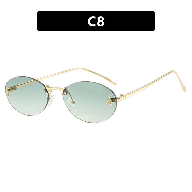 Women's fashionable sunglasses with elegant, round lenses and delicate metal frame Bowlift