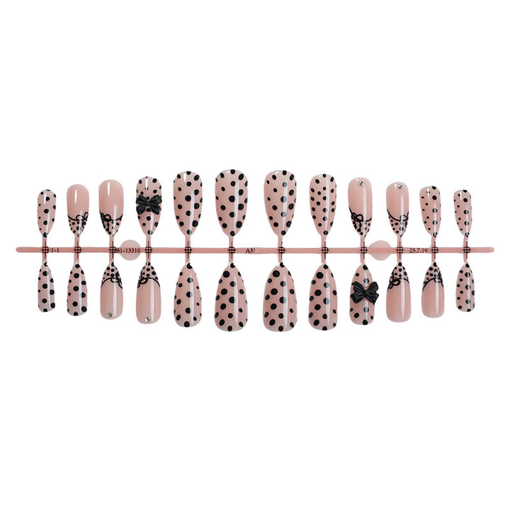 Creative nail art set with elegant dots and bow decorations Bowlift