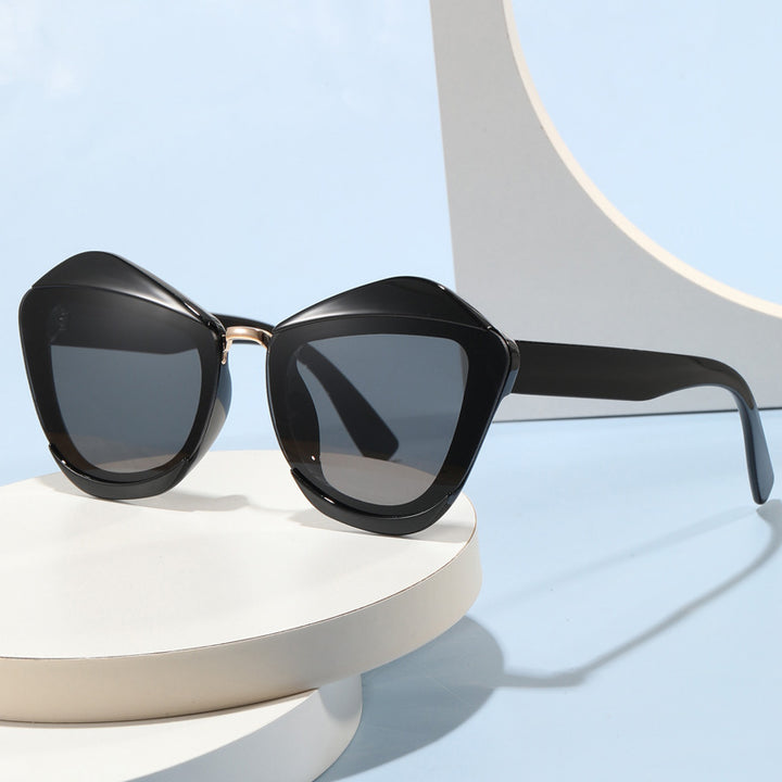 Women striking designer sunglasses with extravagant frame Bowlift