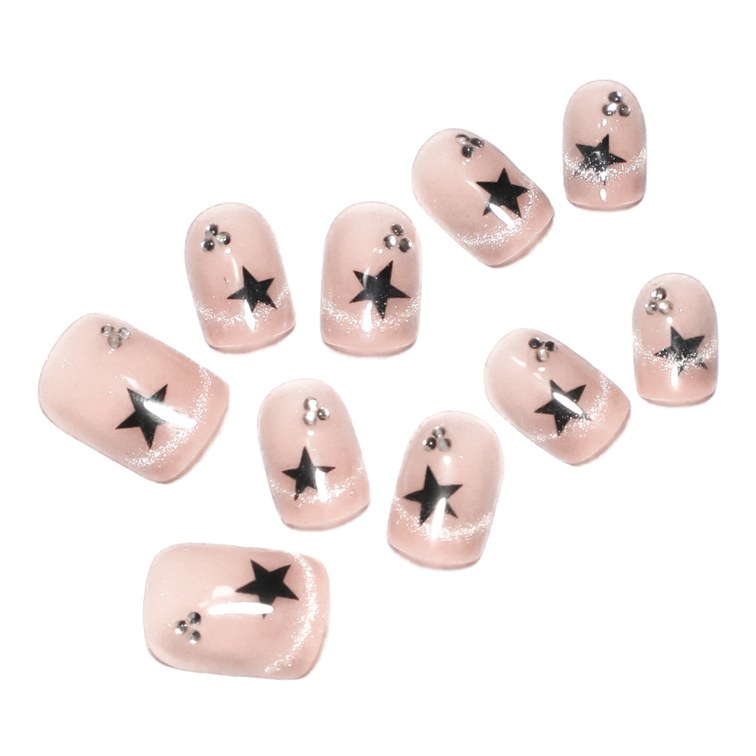 Artistic acrylic nails with glamorous star motifs Bowlift