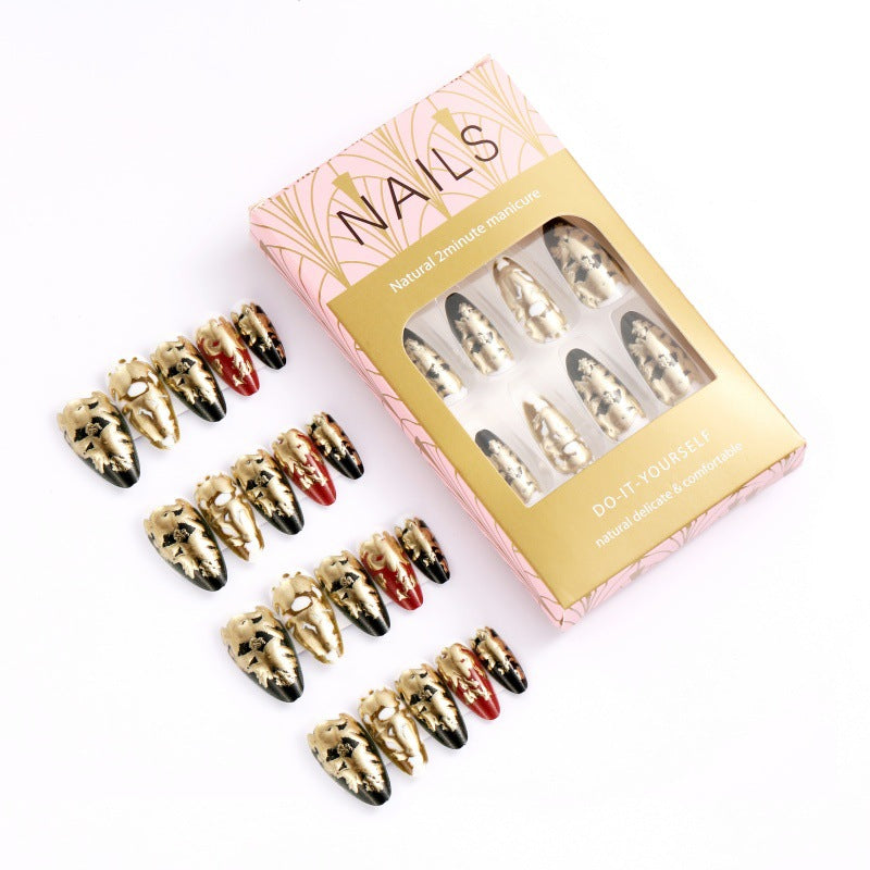 Elegant artificial nails with gold and black pattern Bowlift