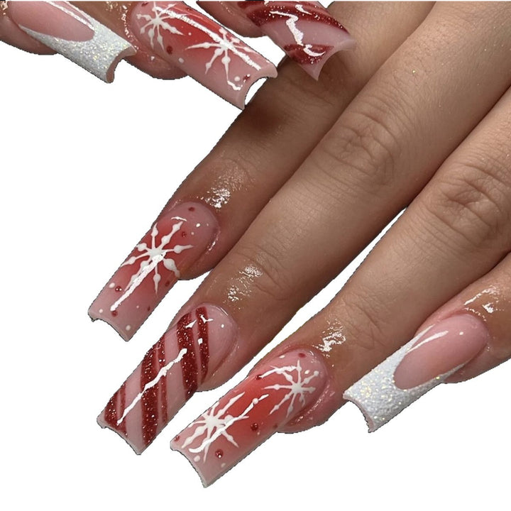 Acrylic nail set with festive candy cane and glitter accents Bowlift