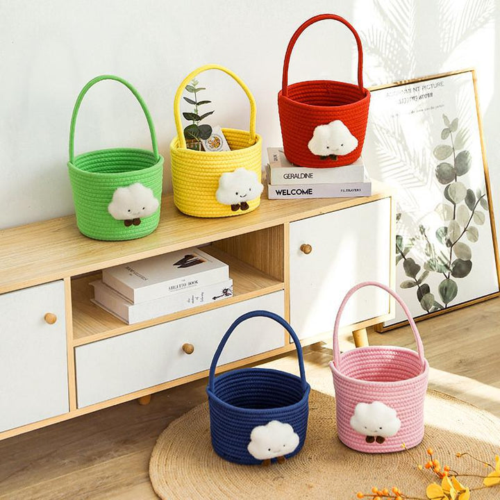 Storage basket with playful cloud motif