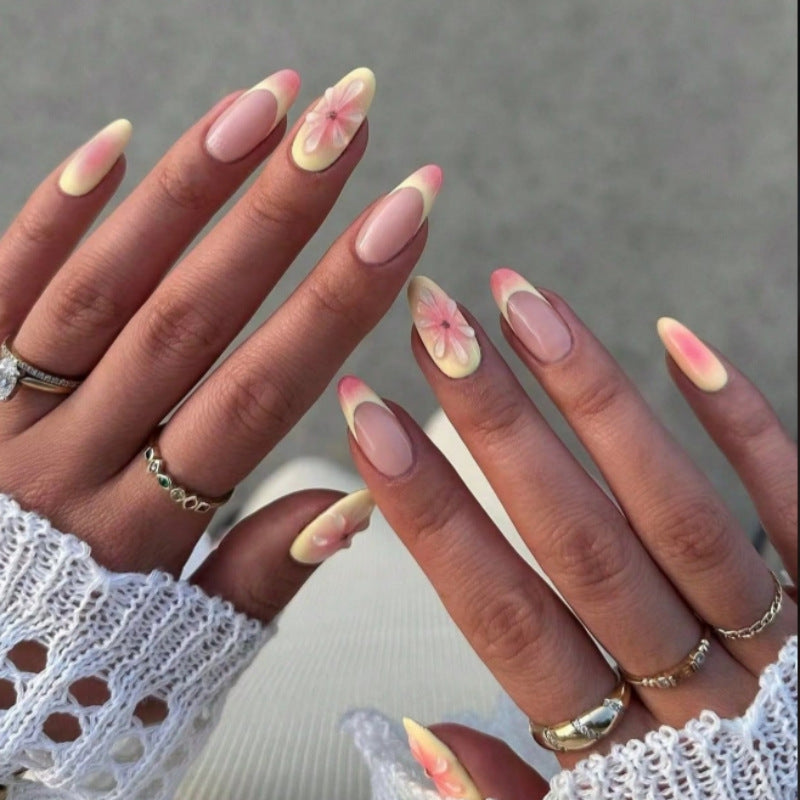 Artistic Press-On Nail Set with Floral Accents Bowlift